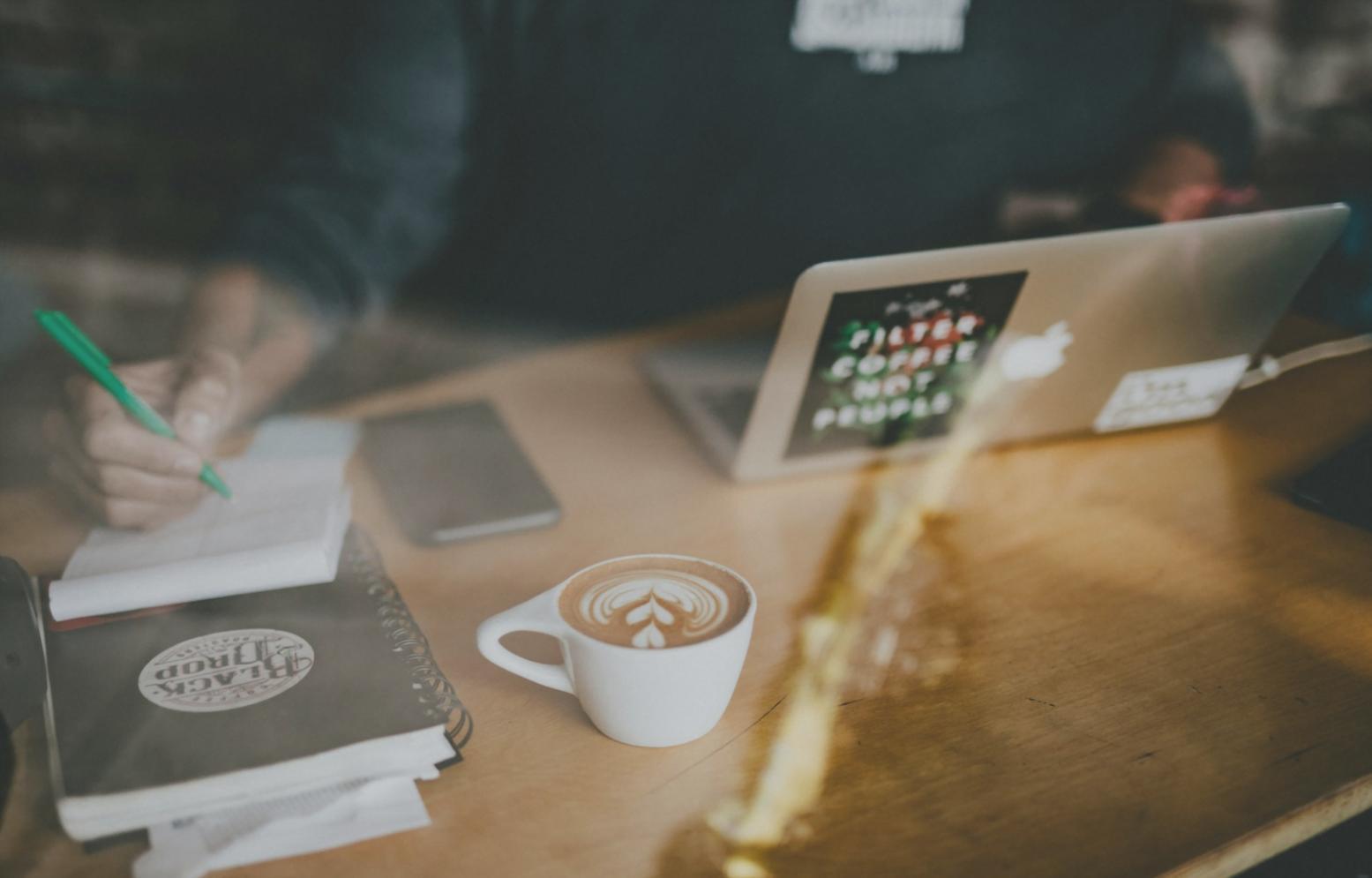 Strategic business meeting with financial documents and analysis reports on table